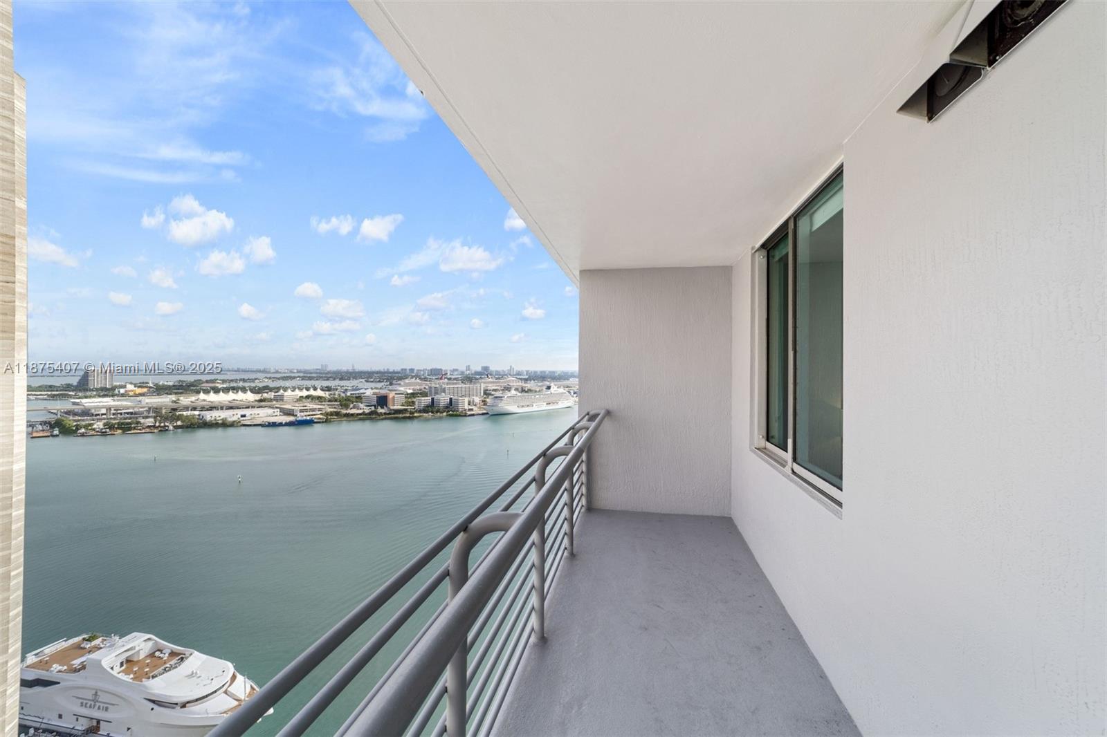 One bedroom, one bath condo on the 29th floor of One Miami East Building, facing N/NE with stunning city and water views. The kitchen features wood cabinetry, granite countertops, laminated floors throughout, washer and dryer in the unit. The building offers 2 pools, a gym, valet parking, 24-hour security, basic cables, and internet included. Very secure building.