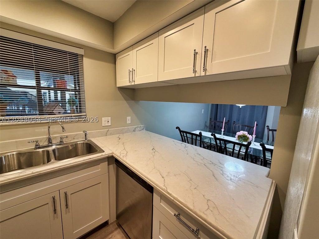 Photo of 8460 Shadow Ct #1-4, Coral Springs, FL 33071 (MLS # A12088034)
