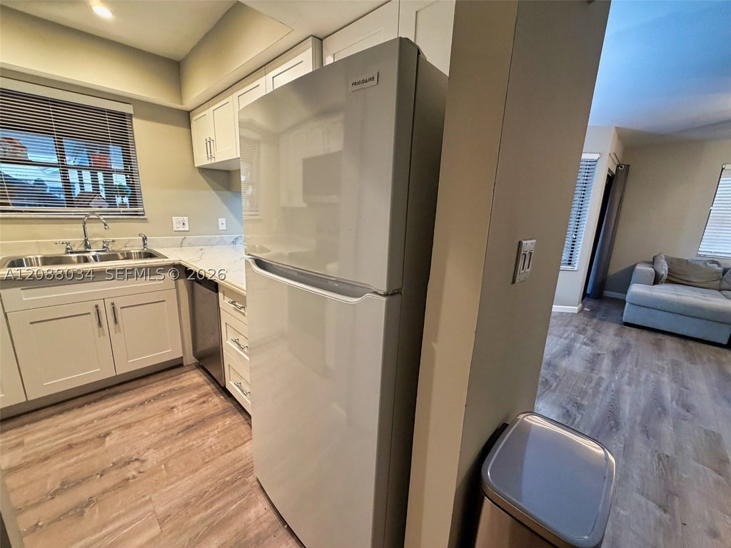 Photo of 8460 Shadow Ct #1-4, Coral Springs, FL 33071 (MLS # A12088034)