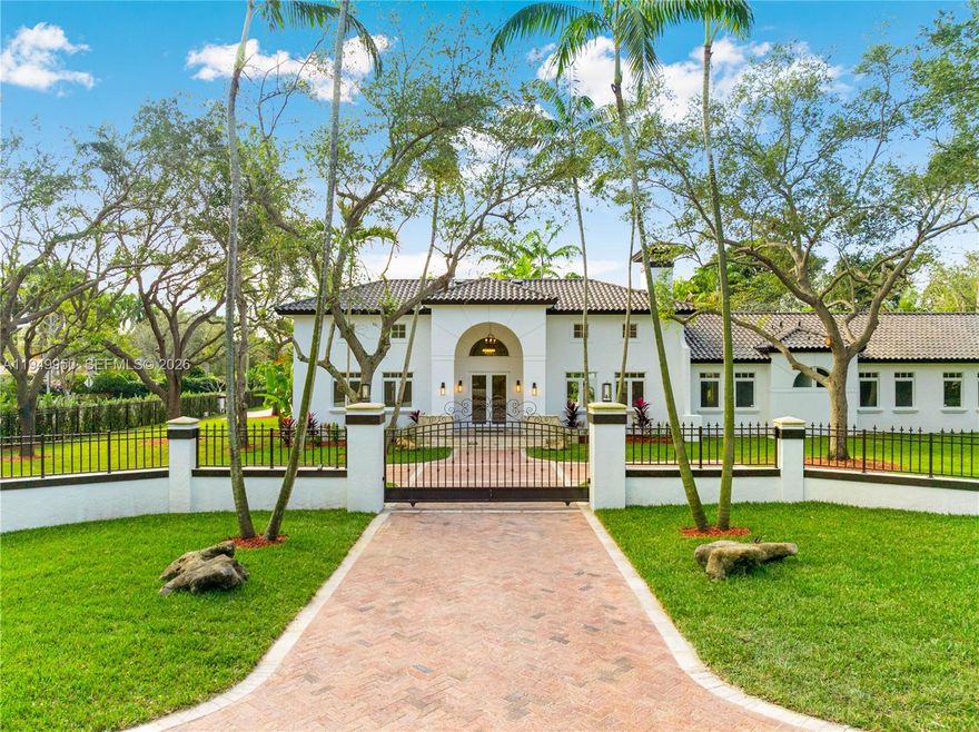 Your private oasis on a highly coveted corner lot awaits! A true builders acre this impressive gated estate delivers exceptional privacy and tranquility. The home features 6 bedrooms, 6.5 bathrooms - including a mother-in-law suite, a 3-car garage, fireplace, pool and hot tub, and generous indoor and outdoor spaces ideal for entertaining. 

Arrive via a quiet, tree-lined street with a lush canopy that opens to a private retreat surrounded by mature oak trees. This Mediterranean-style residence combines timeless architecture with a bright, contemporary open layout. Soaring vaulted ceilings and plentiful natural light elevate the home’s expansive, airy feel.

Located in a highly sought-after neighborhood, the property is just minutes from beaches, marinas, dining, recreation, and premier shopping, and is zoned for excellent schools.
Take a video tour! https://youtu.be/gA1SWNu-Uys