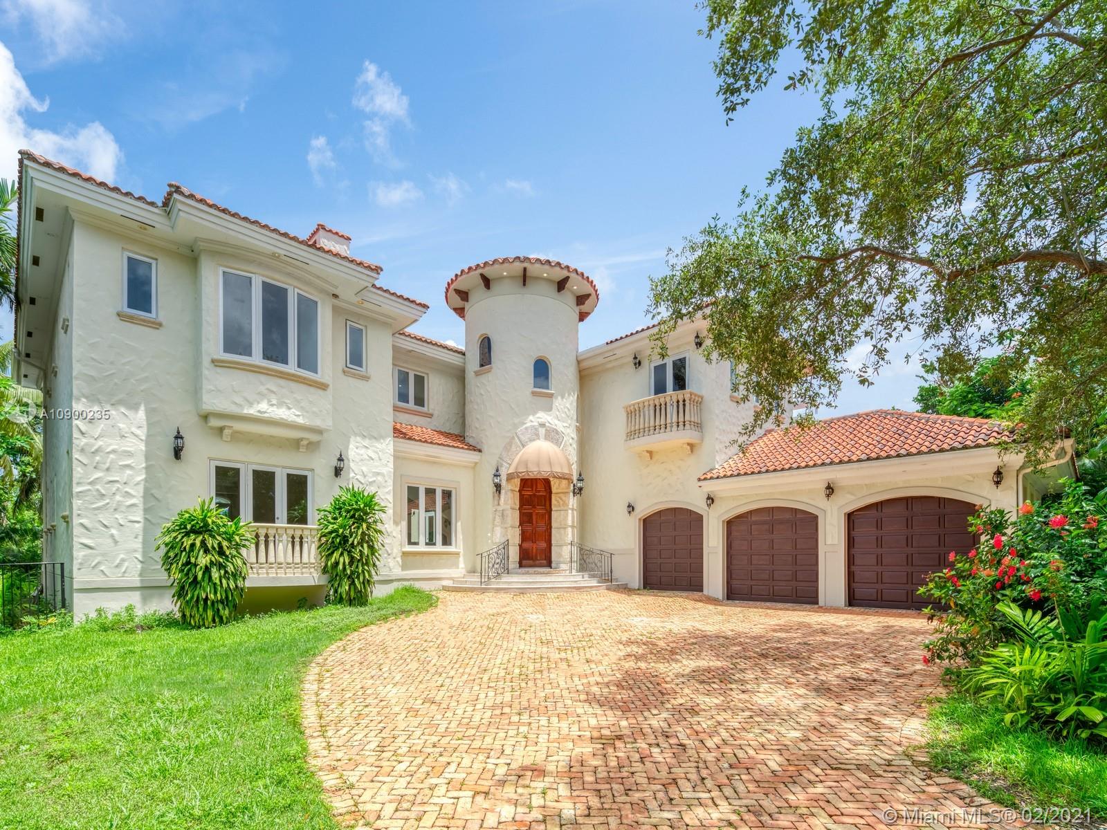 Gated and walled-in, this Islands of Cocoplum waterfront renovated estate has a grand staircase upon entry with dramatic volume ceilings. Brand-new marble floors flow throughout the living areas. Light-filled with high-impact windows. En-suite bedroom/office downstairs. A chic fireplace in the living room plus adjoining family room with a built-in bar and Cabana bath offer the perfect setting for relaxing or entertaining. Walk right out to the luxurious patio, expansive pool and covered porch for some sunny South Florida living. Split floor plan upstairs with the master on one side and 3 en-suite bedrooms on the other. The master bathroom offers two separate water closets. Separate maid’s wing downstairs provides privacy adjacent
to the laundry room and three-car garage.