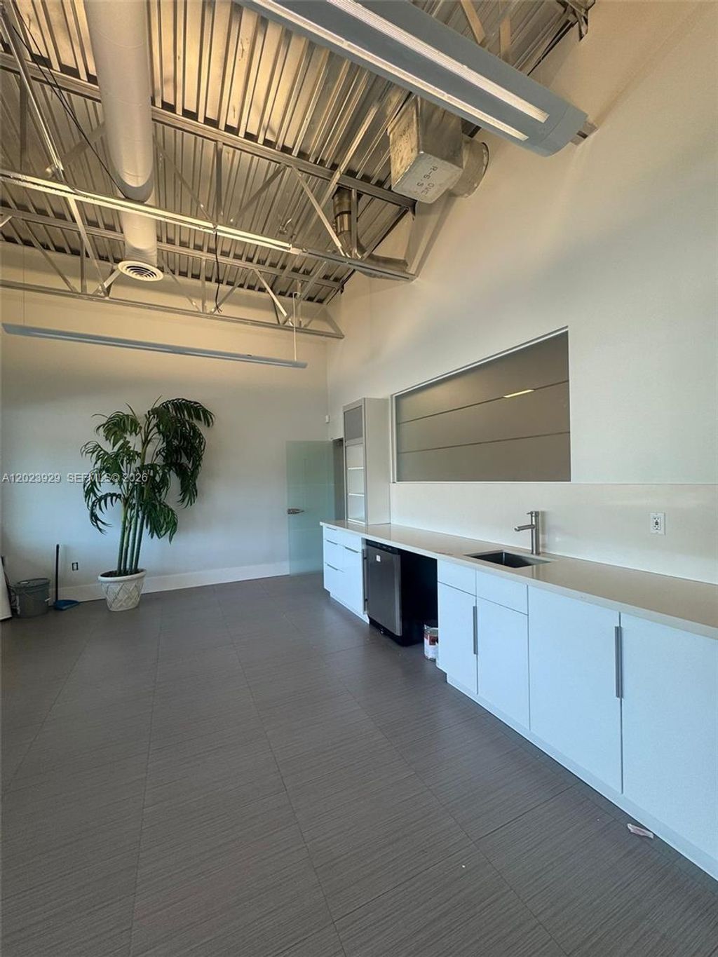 Photo of 3098 Stirling Rd #101, Hollywood, FL 33021 (MLS # A12023929)
