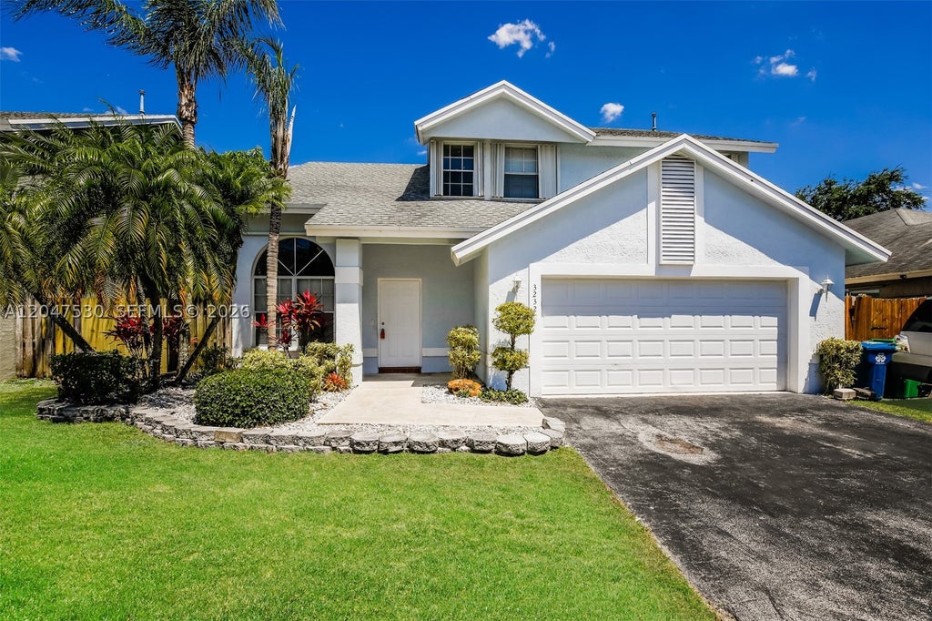 Photo of 3232 NW 121st Ave, Sunrise, FL 33323 (MLS # A12047530)