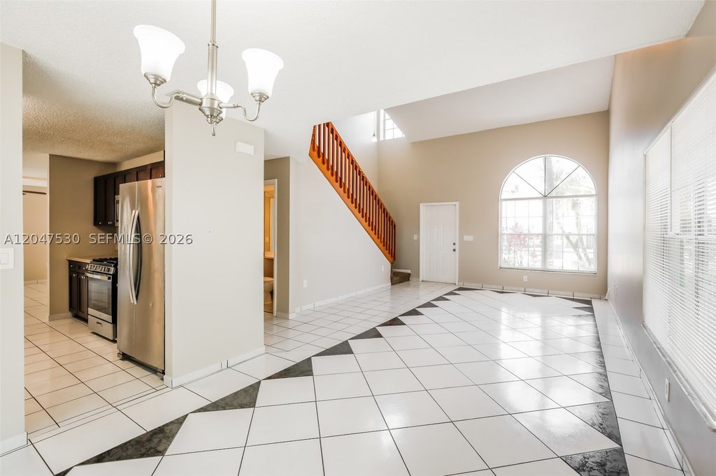 Photo of 3232 NW 121st Ave, Sunrise, FL 33323 (MLS # A12047530)