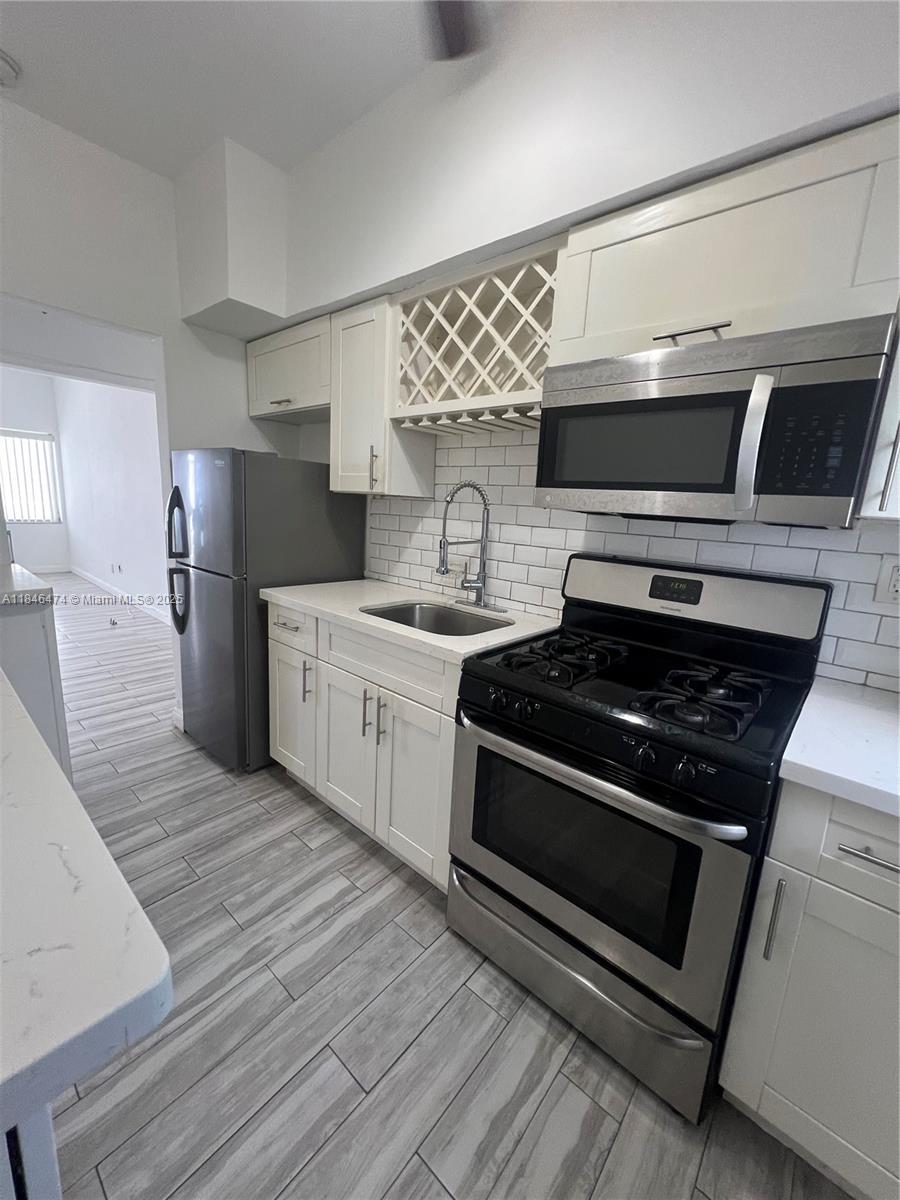 Spacious one bedroom, 1 bathroom located in the heart of North Beach. Unit offers tile floors, white custom cabinetry, stainless steel appliances & open style kitchen. Building is well managed and offers an amazing inlet view. Minutes away from the beach, Normandy Isles, North Bay Village and Surfside. Water included.