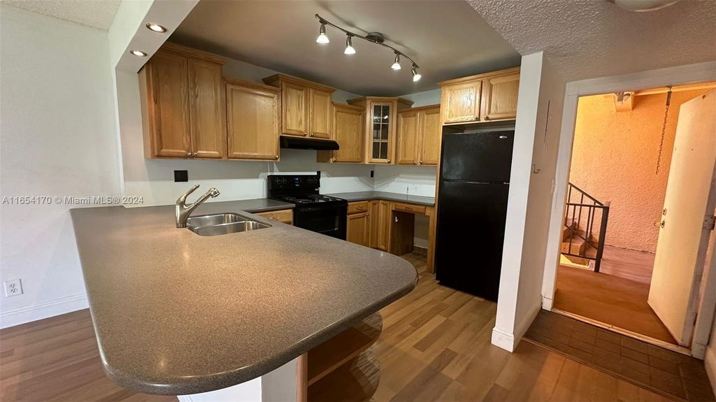 Photo of 430 Commodore Dr #208, Plantation, FL 33325 (MLS # A11654170)