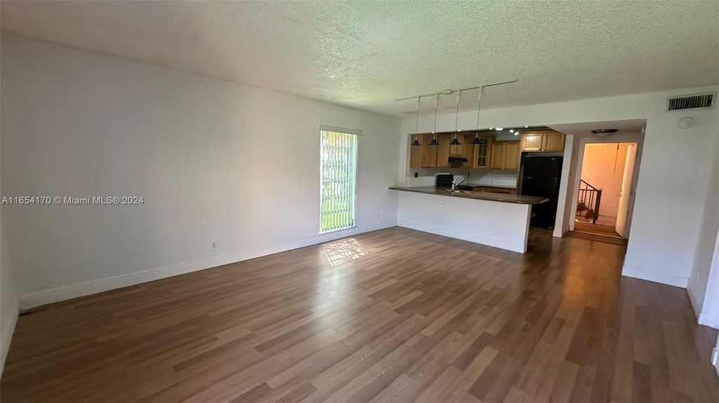 Photo of 430 Commodore Dr #208, Plantation, FL 33325 (MLS # A11654170)