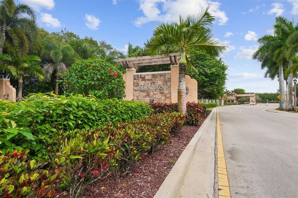 Photo of 1049 SW 147th Ave #5607, Pembroke Pines, FL 33027 (MLS # A12011402)