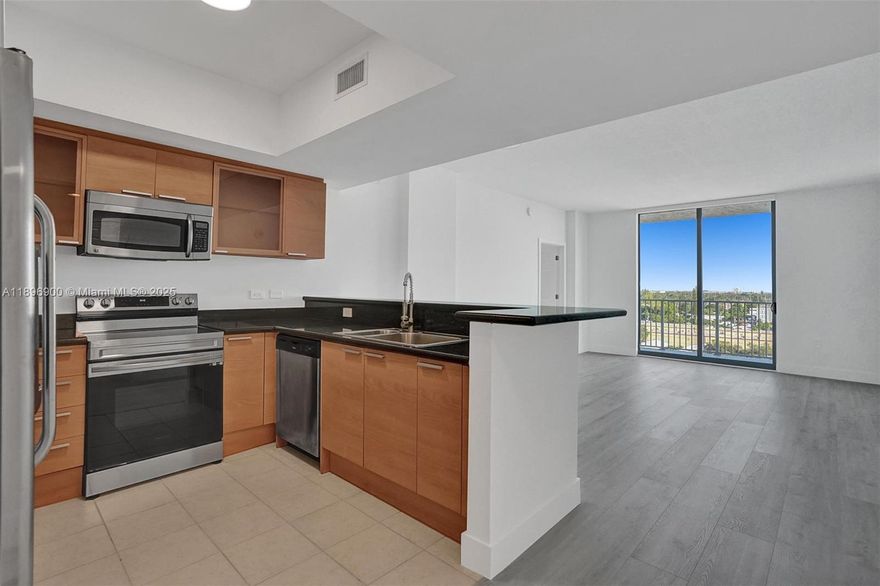 Amazing 2-bedroom, 2-bathroom unit located on the 8th floor of the desirable Hollywood Station Condominium, offering stunning skyline views. Enjoy a split floor plan with an open, full-sized kitchen featuring stainless steel appliances, granite countertops, and an in-unit washer and dryer. Perfectly situated within walking distance to shops, dining, parks, and entertainment, and just minutes from the beach. Excellent access to major highways and only 15 minutes from Fort Lauderdale Airport. Building amenities include a fully equipped gym, billiards room, clubroom, resort-style pool with open sundeck, relaxing spa, and valet parking.