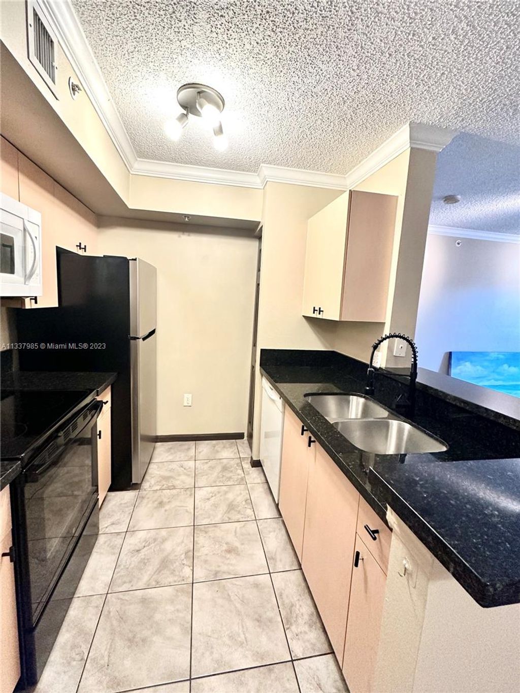 Photo of 2457 Centergate Dr #207, Miramar, FL 33025 (MLS # A11337985)