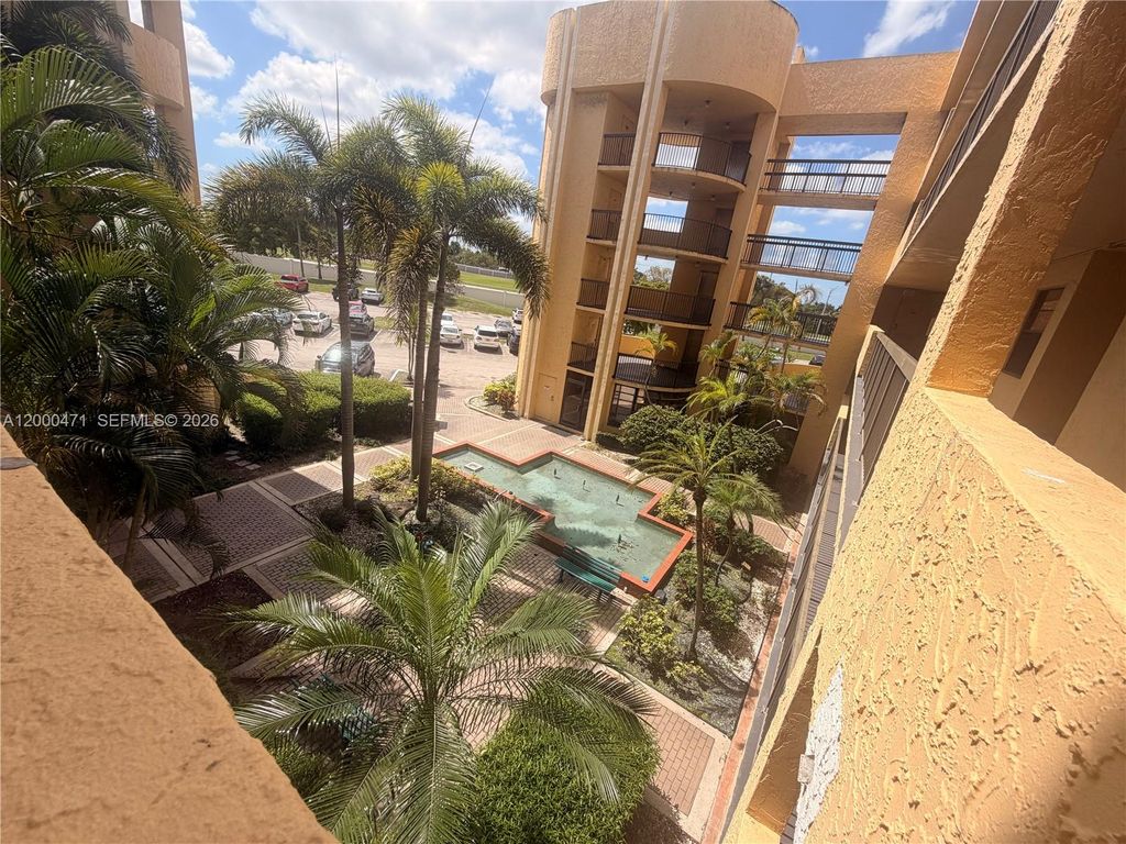 Photo of 6475 W Oakland Park Blvd #308, Lauderhill, FL 33313 (MLS # A12000471)