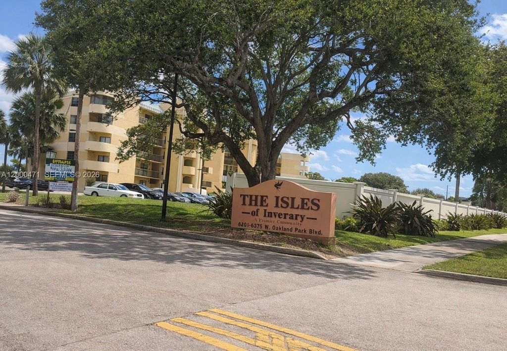 Photo of 6475 W Oakland Park Blvd #308, Lauderhill, FL 33313 (MLS # A12000471)