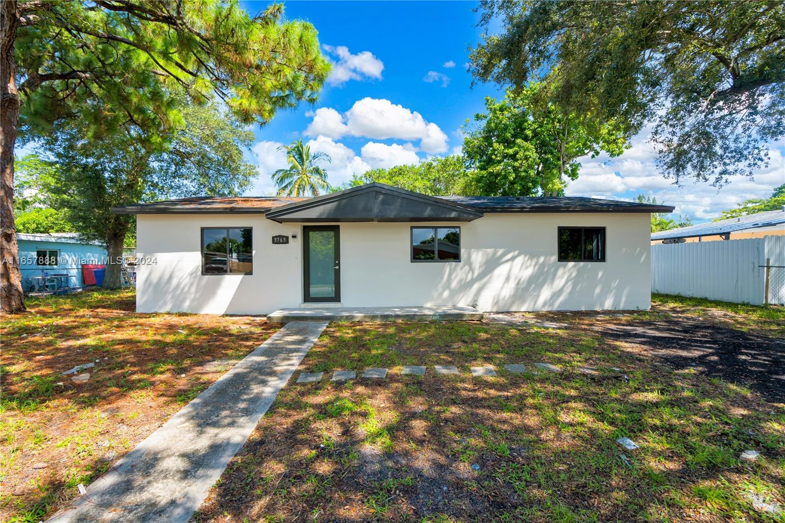 This beautifully remodeled home combines modern elegance with cozy comfort, featuring an open-concept living area, kitchen with quartz countertops and stainless steel appliances, The highlight is the expansive patio, perfect for entertaining, build a pool and storage your toys.