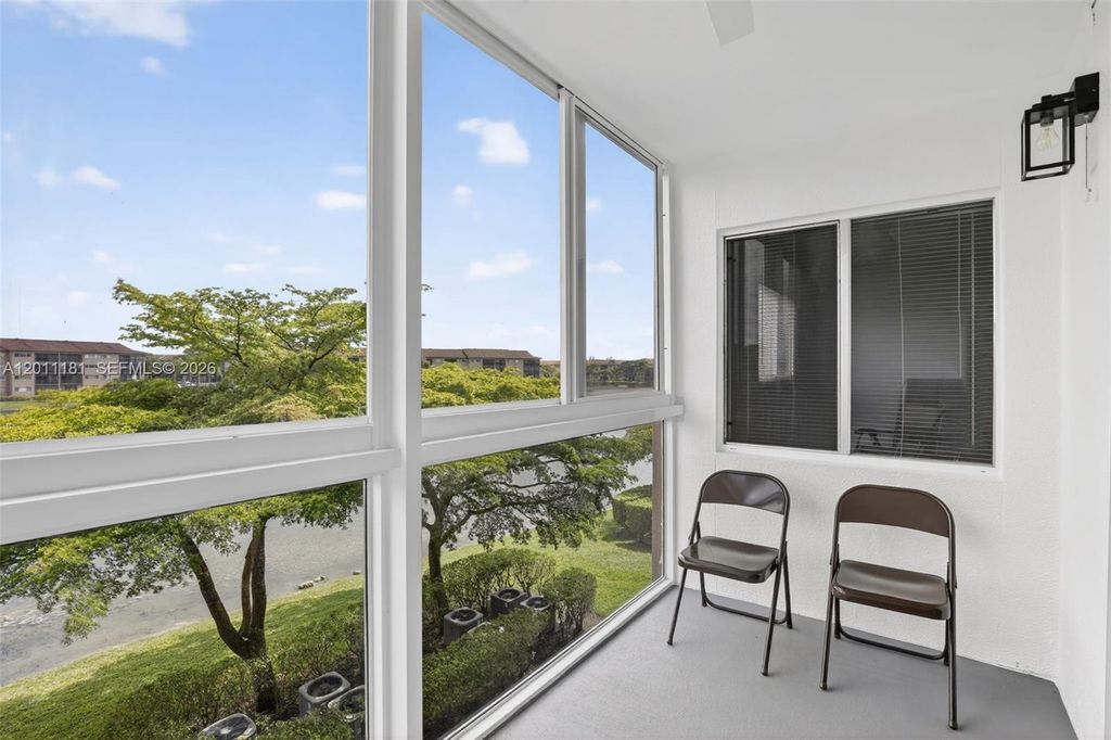 Photo of 13700 SW 11th St #309A, Pembroke Pines, FL 33027 (MLS # A12011181)