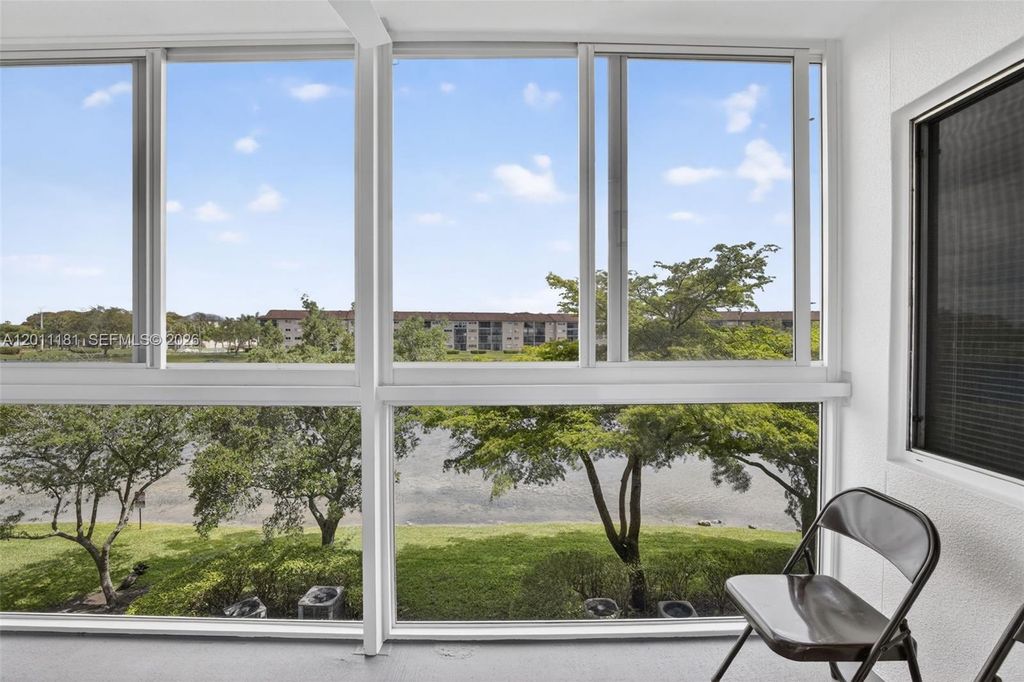 Photo of 13700 SW 11th St #309A, Pembroke Pines, FL 33027 (MLS # A12011181)