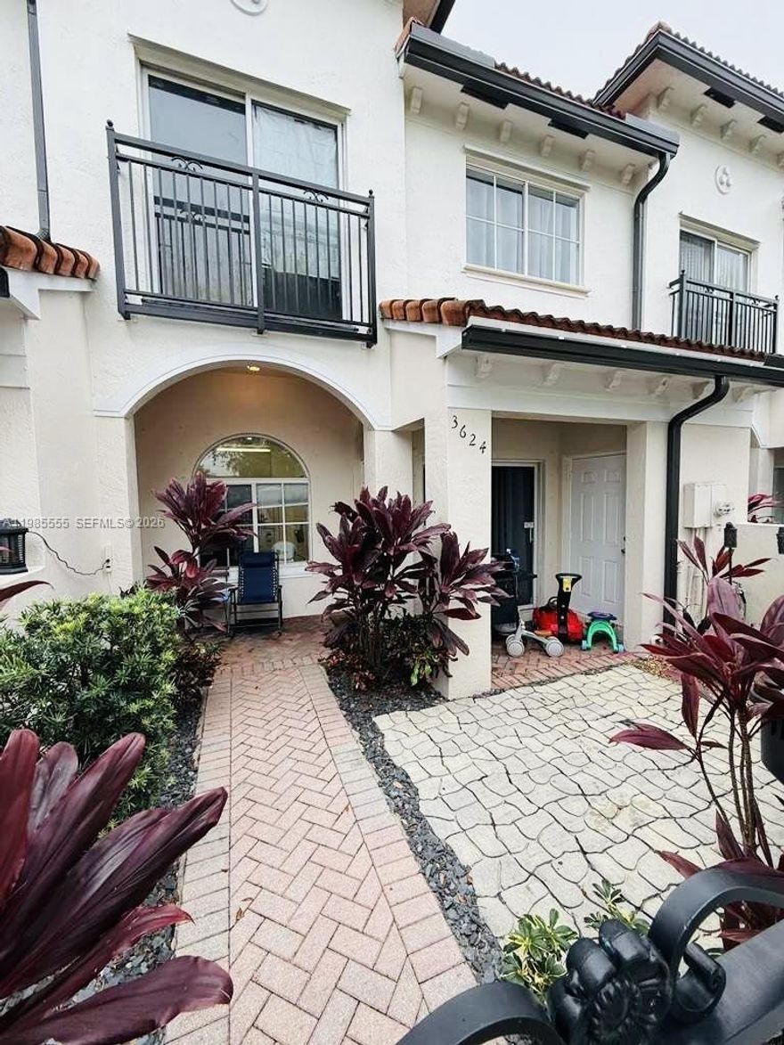 Clean and Move-In ready, 2-bedroom, 2.5 bath Townhouse in the well-kept family community of Bella Vista.  With laminate floors throughout, enjoy the many upgrades such as a new AC unit, inside and outside, new electric water heater and new kitchen sink.  Enjoy your front patio and private garden or barbeque area with families and friends.  This community is centrally located between 441 and I-95, just minutes to downtown, beaches and shopping.  Enjoy the clubhouse, pool, basketball and picnic area and much more!