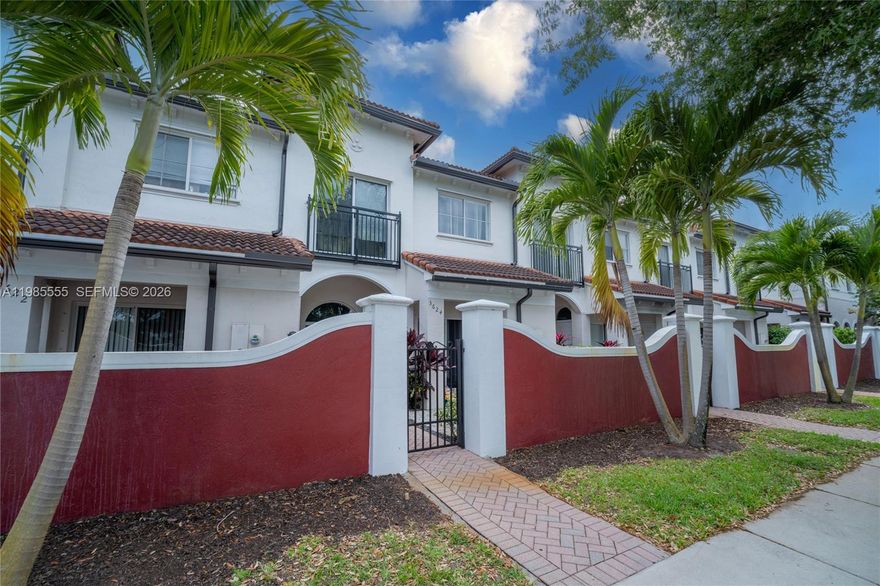 Clean and Move-In ready, 2-bedroom, 2.5 bath Townhouse in the well-kept family community of Bella Vista.  With laminate floors throughout, enjoy the many upgrades such as a new AC unit, inside and outside, new electric water heater and new kitchen sink.  Enjoy your front patio and private garden or barbeque area with families and friends.  This community is centrally located between 441 and I-95, just minutes to downtown, beaches and shopping.  Enjoy the clubhouse, pool, basketball and picnic area and much more! HOA includes home internet and cable!