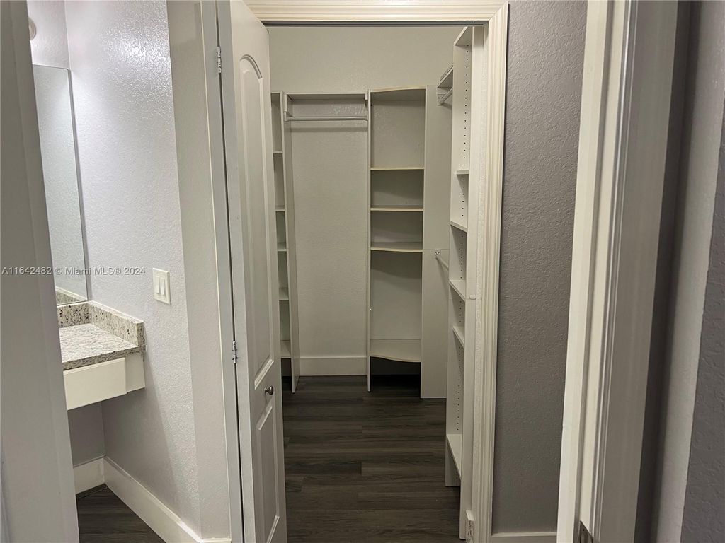 Photo of 11010 Legacy Dr #103, Palm Beach Gardens, FL 33410 (MLS # A11642482)