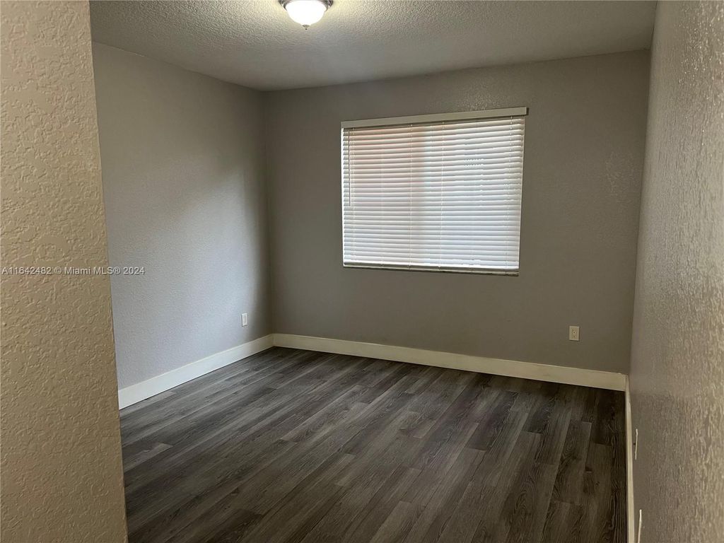 Photo of 11010 Legacy Dr #103, Palm Beach Gardens, FL 33410 (MLS # A11642482)