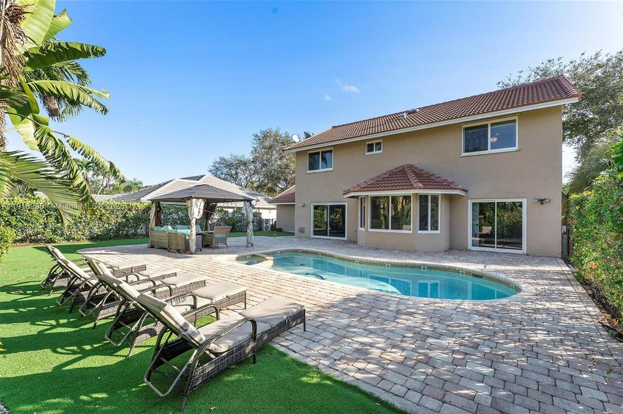 Beautifully renovated 2-story single-family home located on an oversized corner lot. This property boasts 5 bedrooms and 3 bathrooms, offering ample space and comfort for any family. The home features a stunning open kitchen, equipped with elegant quartz countertops and modern stainless steel appliances, perfect for culinary enthusiasts. Adjacent to the kitchen is a charming breakfast nook, providing lovely views of the pool. The first floor showcases durable wood-like tile flooring throughout, while the second floor is finished with high-quality laminate, ensuring a cohesive and stylish aesthetic. For added convenience, one bedroom and a full bathroom are ideally situated on the first floor, while the laundry area, complete with newer washer and dryer, is located on the second floor. Step outside to discover a large, fully fenced backyard, a true entertainer's paradise. It features a sparkling pool and a spacious lanai, creating an ideal setting for gatherings and relaxation. Upgrades include a NEW ROOF 2024, a NEW AC 2025, a water heater 2019, and impact windows and doors. 2-car garage with a large driveway fits 4 additional cars.  Located in an A-rated school district, the home provides unparalleled access to amenities and transportation, including Sable Pines Park, Promenade Coconut Creek, and major highways. Mortgage savings may be available for buyers of this listing.