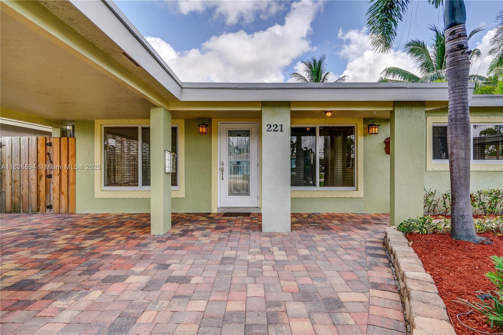 Upgraded 2/2 pool home in North Andrews Gardens, Maple kitchen with granite counters and mosaic back splash, polished terrazzo floors throughout, impact windows, central a/c, new front loading washer/dryer, tropical fenced backyard with pool & raised spa, carport, perfect condition