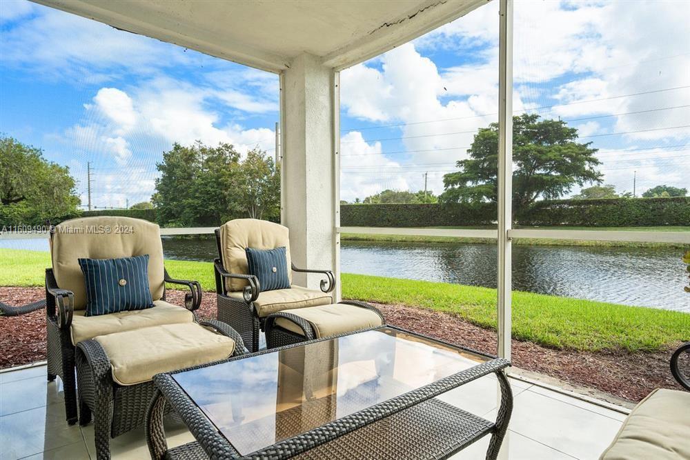 *TENANT OCCUPIED* INVESTORS LOOKING FOR TENANT IN PLACE. Tenant is paying $1,900/m until March 2026. AMAZING 2 BEDS/2 BATHS condo overlooking the peaceful water and being a corner unit located on the 1st floor. Parking space right in front of the unit and washer/dryer are inside the home. Condo is well divided to bring in privacy. Kitchen is equipped with stainless steel appliances and a dishwasher. Monthly HOA fees included water, basic cable and internet. AC and WATER HEATER are about 3 years old. Credit score is 700 MINIMUM. One pet of 40lbs max accepted.
Balcony is unusable for unknown amount of period. Reserves in the community are good. The two sliding doors are new and hurricane impact!