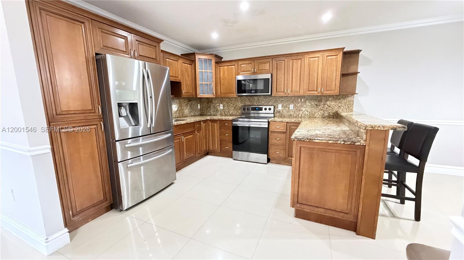 LLANOS AT BIRD ROAD - Residential Lease