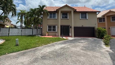 Photo of 7733 NW 192 St, Hialeah, FL 33015 (MLS # A12055479)