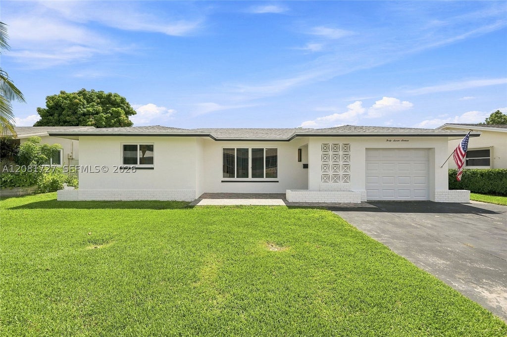 Photo of 4716 NW 48th Ave, Tamarac, FL 33319 (MLS # A12081727)