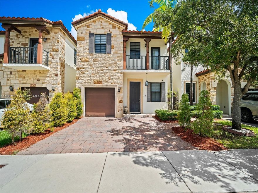 This beautifully updated home features stunning downstairs flooring, a remodeled open-concept kitchen, living, and dining area, plus a custom built-in TV wall with an electric fireplace. Enjoy modern touches throughout, including zebra shades, remodeled closets, and a stylish half-bathroom. The home also offers a large pantry and new washer & dryer for convenience.

Upstairs, glass railings add a sleek, contemporary feel. Step outside to your private oasis with a newly installed pergola, built-in BBQ, fridge, and granite countertop — perfect for entertaining!

Located in a desirable, quiet community near top schools, parks, shopping, dining, and minutes from Downtown Doral & City Place. Truly move-in ready with every detail upgraded for style and comfort!