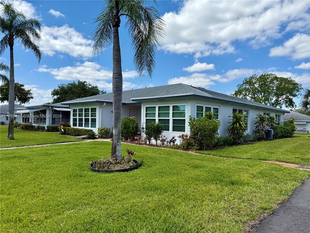 Photo of 1075 Circle Dr #D, Delray Beach, FL 33445 (MLS # A11783312)