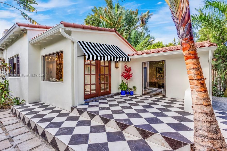 Nestled in the highly sought-after Lake View neighborhood, this exquisite 4-bed, 3-bath renovated home awaits you. Its large windows invite an abundance of light, showcasing the light oak flooring and neutral palette, providing an ideal backdrop for personalized decoration. The enchanting, vaulted ceiling preserves the timeless charm of this abode, while the open kitchen layout creates an inviting space for hosting gatherings. The primary bedroom boasts a spacious, opulent bathroom and a walk-in closet, while also offering picturesque views of the lush garden and heated pool. With impact windows and doors in place, as well as updated plumbing and electrical systems, this residence has been meticulously attended to. Conveniently located just a stone's throw away is the renowned Fisher Park