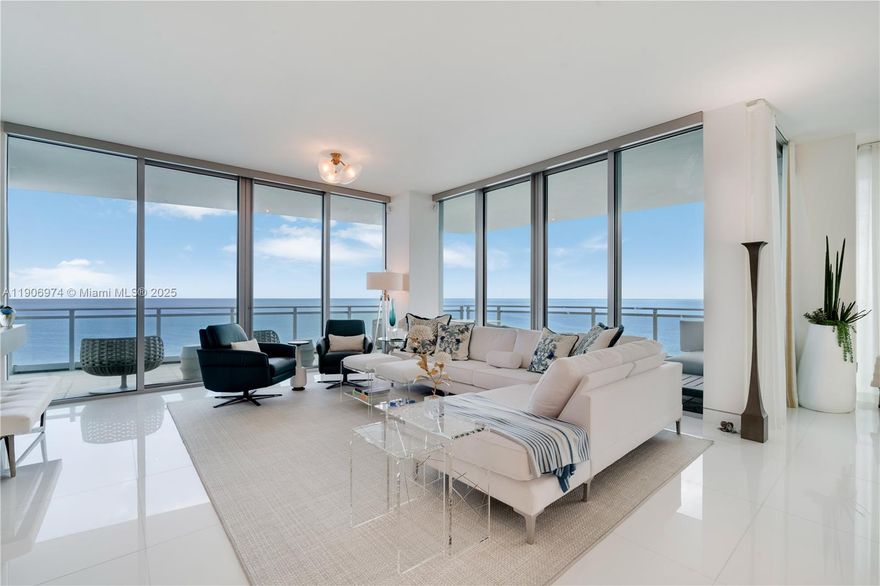 Ultra-luxury corner residence with panoramic ocean views at one of Bal Harbour’s most prestigious addresses. Meticulously redesigned with high-end finishes, this reimagined home features private elevator entry, custom glass accents, and an open, light-filled layout. Enjoy 5-star Ritz-Carlton amenities: beachfront attendants, gourmet dining, full-service spa, fitness center, two pools, valet, concierge, and in-residence service. Steps from world-class shopping and fine dining.