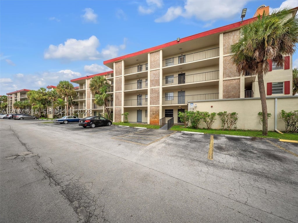 Photo of 3070 NW 48th Ter #111, Lauderdale Lakes, FL 33313 (MLS # A12060685)