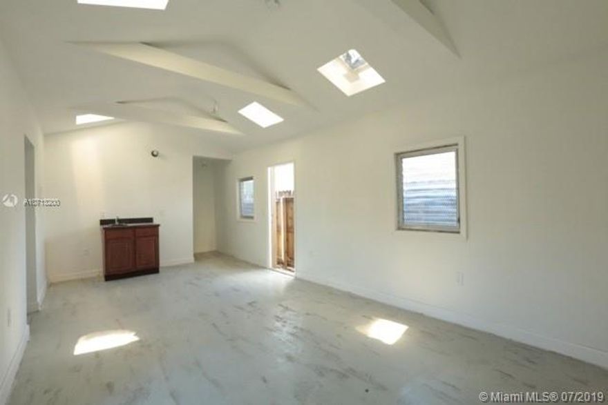 NICE AND AMPLE STUDIO AT WYNWOOD AT ONE OF THE BEST AND MOST DESIRABLE STREETS, BRIGHT UNIT WITH FRIDGE. MICROWAVE, 2-BURNER STOVE, LOWER AND UPPER CABINETS, STAINLESS STEEL WORKTABLE, A/C (COLD), CODED LOCK ACCESS, WINDOW TREATMENTS, LIGHT AND FIXTURES, PRIVATE FRONT PATIOS, CONCRETE FLOORS, HIGH VAULTED CEILINGS WITH SKYLIGHTS, PLENTY OF NATURAL LIGHT AND MEDICINE CABINET IN BATH. COMMON LAWN YARDS. LUSH LANDSCAPE. LAUNDRY FACILITIES.