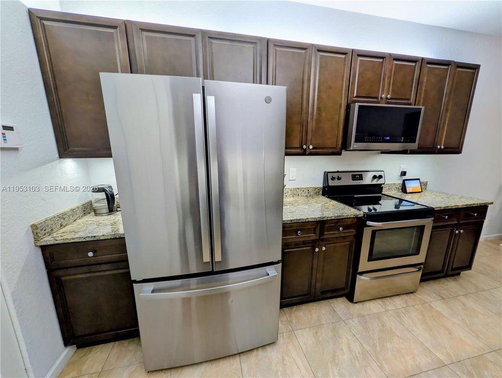 Photo of 3561 Forest Hill Blvd #80, Palm Springs, FL 33406 (MLS # A11953103)