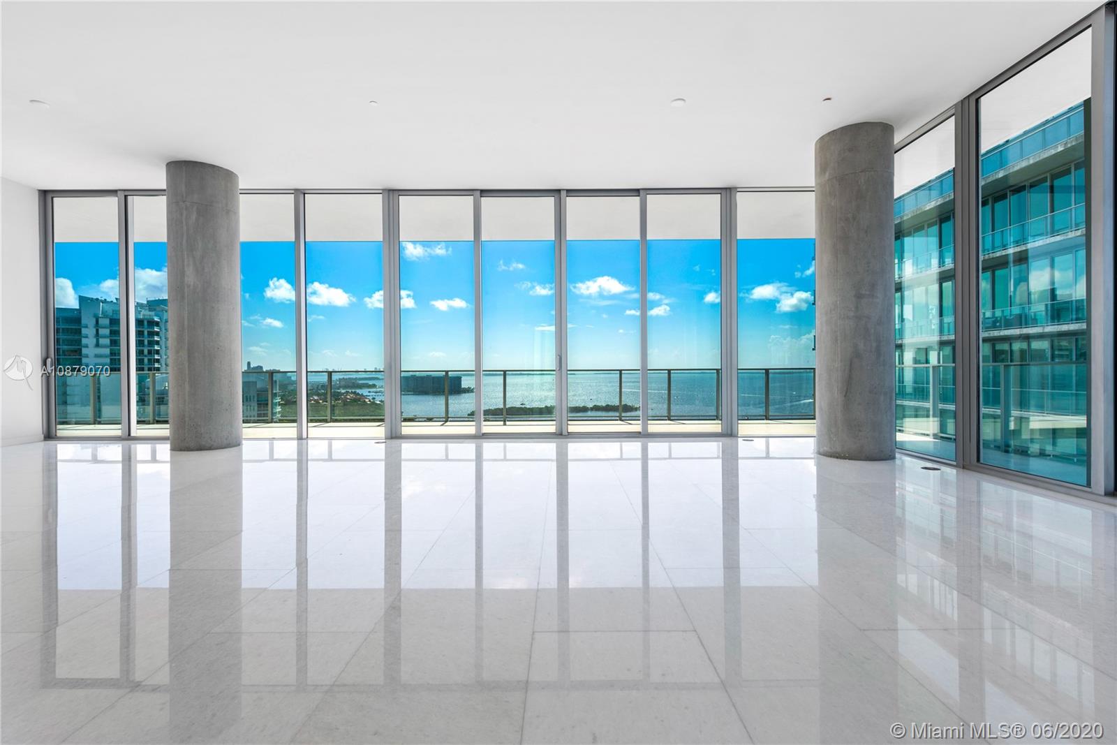 Renovation Just Completed! Uniquely modified floor-plan to boast two huge master walk-in closets and expanded living areas. Spectacular flow-through view from this 4 + maid quarters/6.5 Bath corner unit in the North Tower of award-winning Grove at Grand Bay in Coconut Grove. This highest available 01 floor plan is a true home in the sky, with 12' ceilings, brand newly installed marble and oak wood flooring, no end to views including direct SE views of Bay, boundless light and incredible wraparound balconies. Grove at Grand Bay provides true luxury in design, style, large pool and restaurant, rooftop pool, children's playroom, residence party rooms, pet spa and dedicated white glove concierge. Comes with 2 assigned fully enclosed parking spaces and storage.
