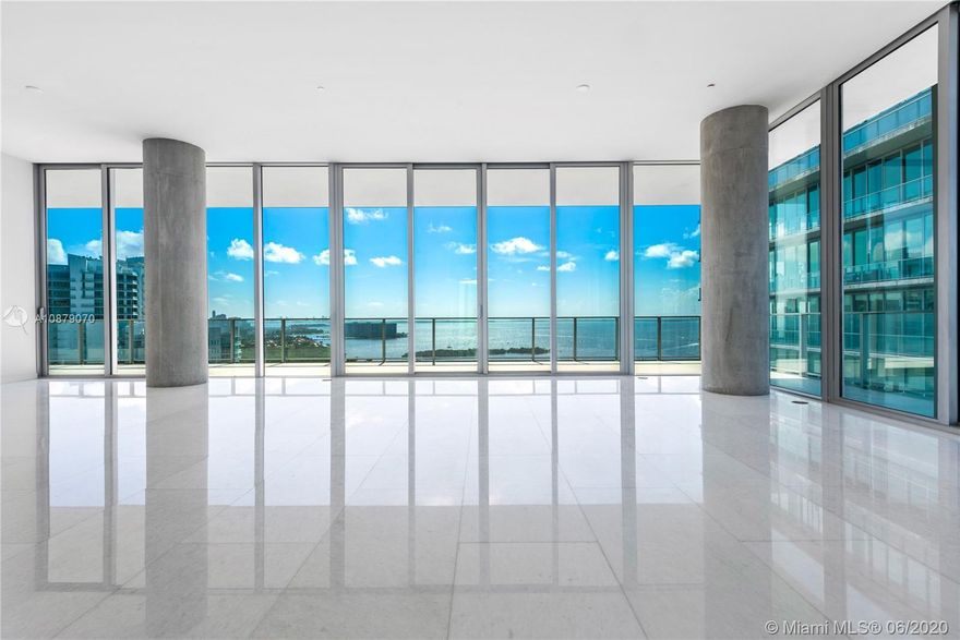 Renovation Just Completed! Uniquely modified floor-plan to boast two huge master walk-in closets and expanded living areas. Spectacular flow-through view from this 4 + maid quarters/6.5 Bath corner unit in the North Tower of award-winning Grove at Grand Bay in Coconut Grove. This highest available 01 floor plan is a true home in the sky, with 12' ceilings, brand newly installed marble and oak wood flooring, no end to views including direct SE views of Bay, boundless light and incredible wraparound balconies. Grove at Grand Bay provides true luxury in design, style, large pool and restaurant, rooftop pool, children's playroom, residence party rooms, pet spa and dedicated white glove concierge. Comes with 2 assigned fully enclosed parking spaces and storage.
