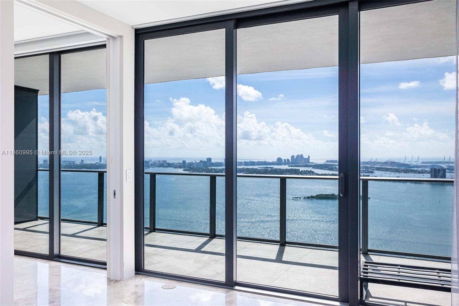 Paraiso Bay #4801: Exquisite Corner Unit Discover this stunning corner unit in the heart of Edgewater, featuring breathtaking views of Biscayne Bay. Boasting 4 bedrooms, 4.5 bathrooms, and an oversized balcony, this residence is fully equipped and move-in ready, complete with custom closets and electric blackout blinds. Enjoy refined marble flooring throughout and the convenience of two parking spaces and a private elevator foyer. Experience resort-style amenities including a full spa, heated lagoon pool, sun terrace, cigar lounge, wine cellar, tennis courts, spin studio, bowling alley, theater room, and billiard room. Unit comes with 2 PARKING SPACES
