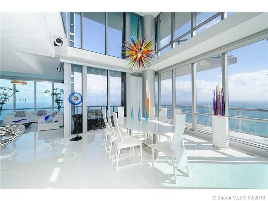 VERY RARE TWO STORY PENTHOUSE AT JADE OCEAN WITH BREATHTAKING FLOOR-TO-CEILING WINDOWS. STUNNING PANORAMIC OCEAN AND CITY VIEWS! UNIT FEATURES TOTAL 4 BEDROOMS AND 4.5 BATHROOMS, BEAUTIFUL WHITE GLASS QUARTZ FLOORS AND ELEGANT FINISHES ALL THROUGHOUT. SP ECTACULAR ROCHE BOBOIS FURNITURE WITH IMPORTED VENETIAN CHANDELIERS. JADE OCEAN FEATURES FULL SERVICE SPA WITH LOUNGE AREA, STATE-OF-ART HEALTH CLUB, 2 SWIMMING POOLS, CHILDREN'S PLAY ROOM, 24H BUSINESS CENTER, PRIVATE BEACH CLUB.
