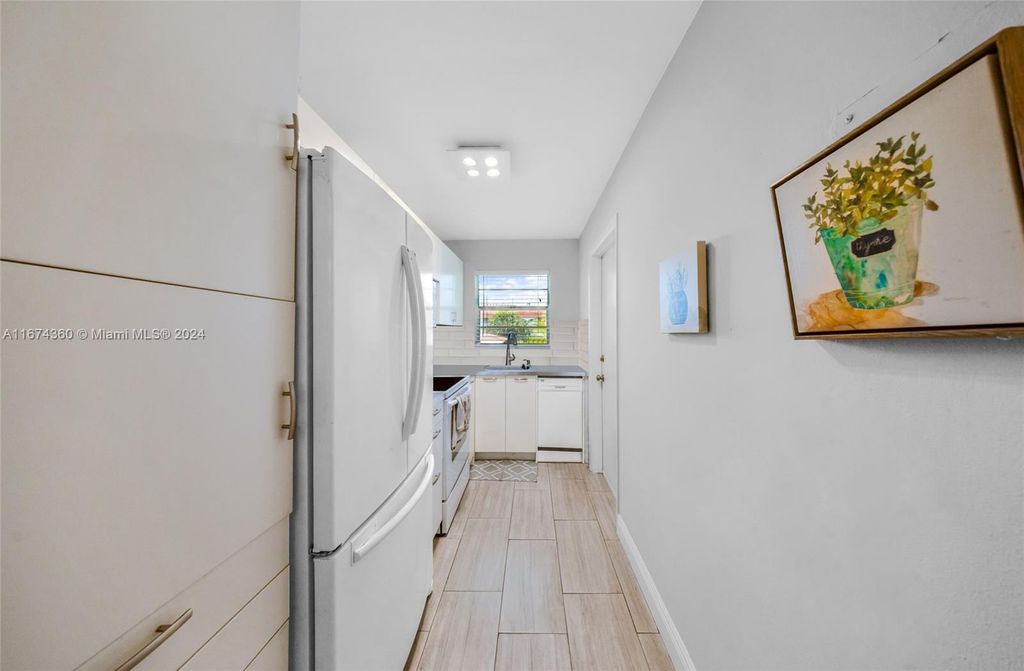 Photo of 581 Blue Heron Dr #205-B, Hallandale Beach, FL 33009 (MLS # A11674360)