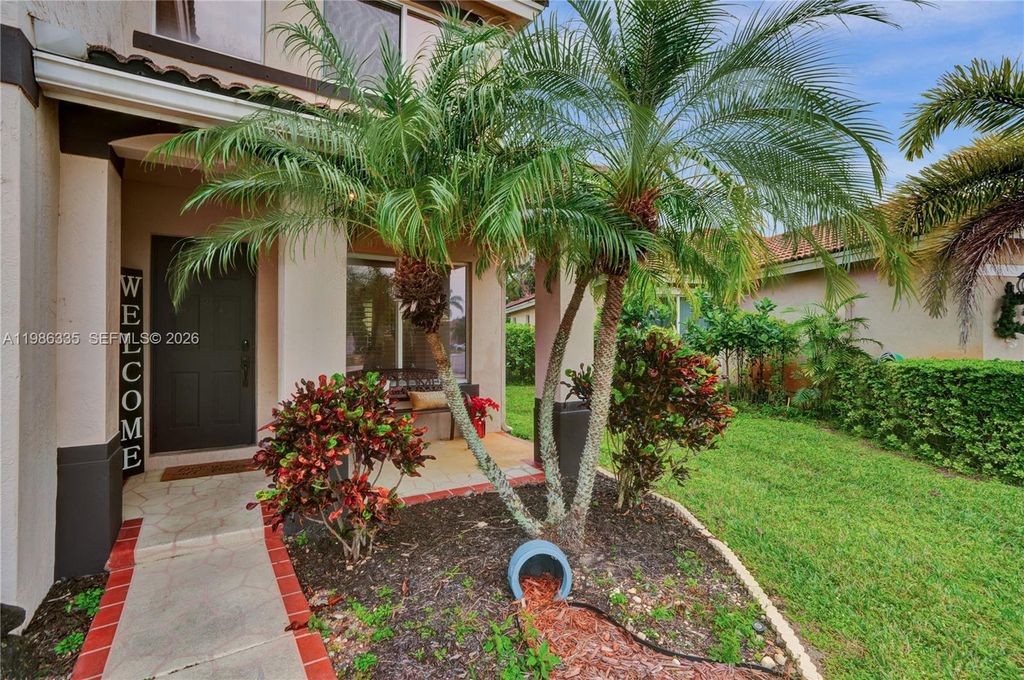 Photo of 4220 NW 62nd Ct, Coconut Creek, FL 33073 (MLS # A11986335)