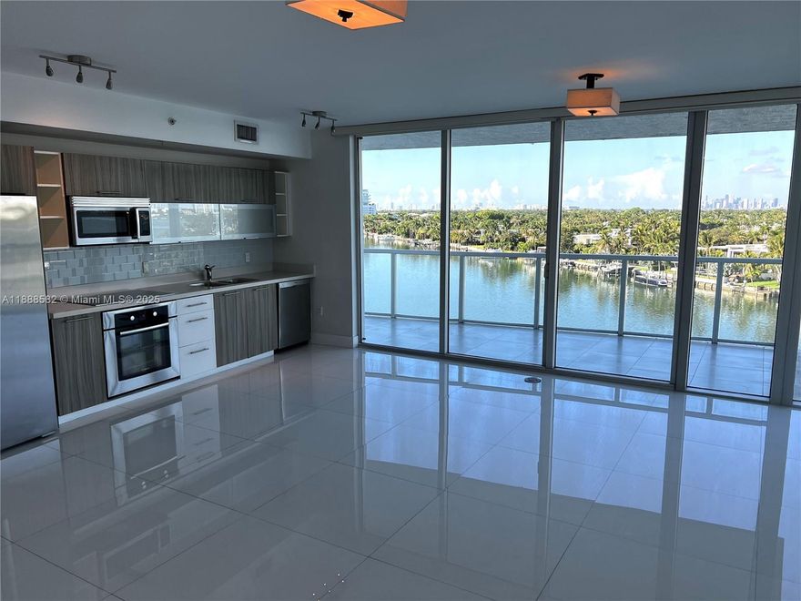 Stunning views of the Bay and Intracoastal. This one of a kind modern corner unit 3 bedroom residence is magnificent! Eden House is a boutique building steps from the beach and features great amenities. Must see to appreciate!