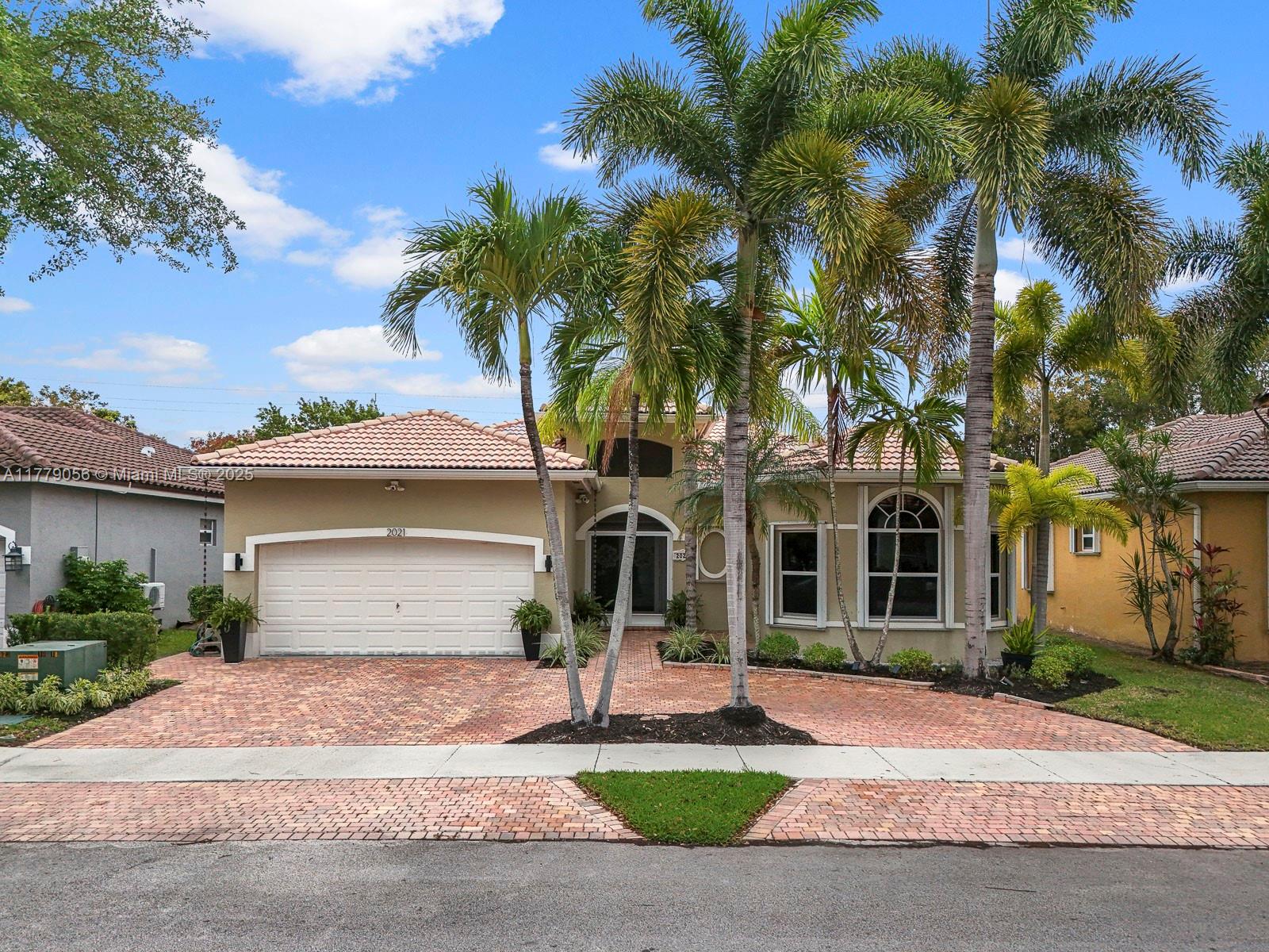 This beautiful open space 4-bedroom, 2.5-bathroom pool home has been completely updated. Get ready to entertain your family and friends this summer. This property features a spectacular kitchen with 2 islands, perfect for gathering while you prepare a great meal with top-of-the-line KitchenAid double oven with convection, stainless steel range, and hood. Enjoy the separate coffee and wine station for your delight. Enjoy the large, screened patio overlooking the pool for entertainment. All bathrooms have been upgraded tastefully.brand new pool speed pump with filter, water filter system, new AC and tile throughout bedrooms. Your 2-car garage with a circular driveway is all in sought-after Keys Landing community,shops,restaurants,highways. Bring all offers Owner motivated.