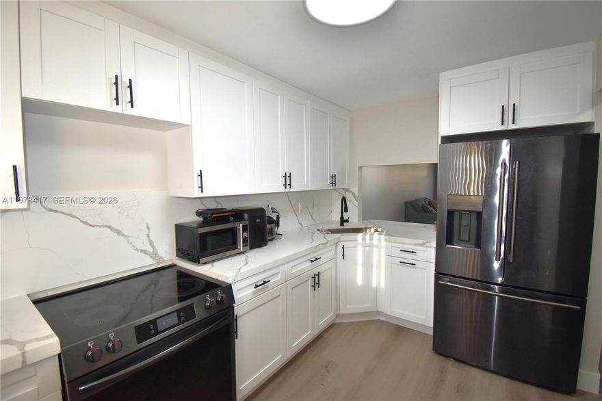 Completely renovated and move in ready first floor location 2 bedroom 2 bath condo offers a , full size washer and dryer inside the unit ,renovated kitchen with newer appliances , fully renovated bathrooms , newer light fixtures throughout , newer flooring throughout and screened porch. All ages and pet friendly  community includes, 2 pools, Gym, tennis court, community center, a BBQ area, and plenty of parking space. Association fees includes exterior building Insurance, water, trash & sewer, landscaping, and pest control. The building has passed the 40 yr certification. No special assessments or credit score requirements as per Association.