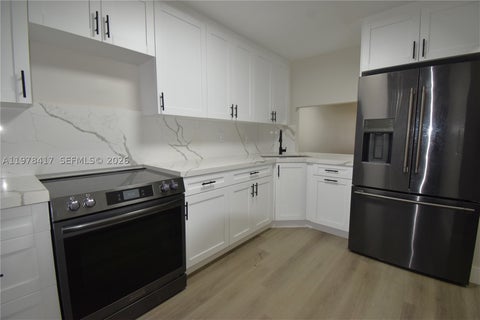 Photo of 7500 NW 17th St #102, Plantation, FL 33313 (MLS # A11978417)