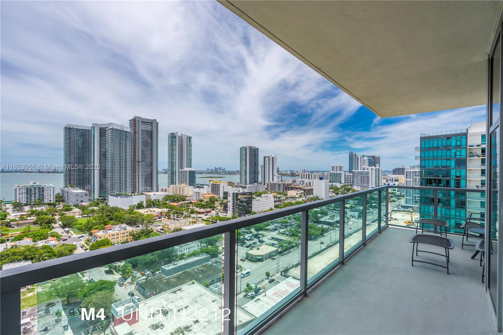 Modern 2-Bedroom, 2-Bath Corner Apartment in Midtown 4 in Midtown Miami.
Experience contemporary living in this stunning corner residence featuring stainless steel appliances, floor-to-ceiling windows, exposed concrete ceilings, and a spacious wrap-around balcony with panoramic views of the bay and city skyline. Midtown 4 offers top-tier amenities including an infinity-edge pool, BBQ area, fully equipped fitness center, and an elegant lobby with concierge service. Enjoy the unbeatable location—just steps from premier shopping, dining, and entertainment in the Miami Design District and Wynwood Art District.