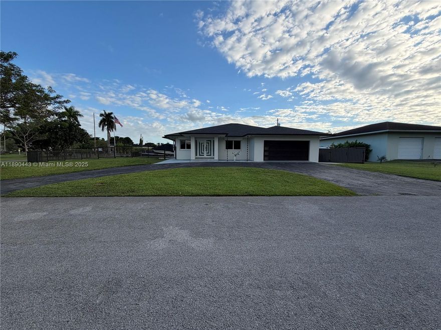 Calling all golfers and non-golfers alike! Discover this spectacular corner home featuring 4 bedrooms, 3 bathrooms, and 2 master suites with stunning golf course views right from your backyard.

This beautifully maintained property includes a brand-new roof (2024, done with permits), hurricane-impact doors and windows, and roll-down shutters for extra storm protection. The screened-in patio with a full outdoor kitchen is perfect for entertaining or simply relaxing while enjoying peaceful golf green scenery.

Located in a quiet, residents-only area, this home offers the privacy of a secluded retreat while still close to all conveniences. Don’t miss this opportunity to own your own piece of paradise in the Redlands — homes like this rarely become available!