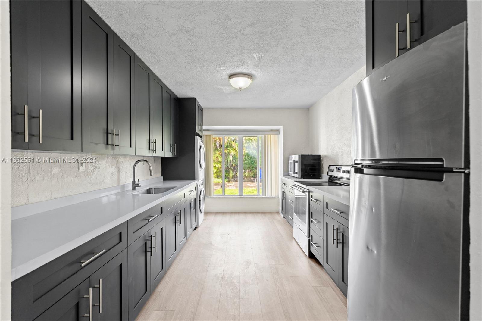 This bright, recently updated rental includes two spacious bedrooms, two modern bathrooms, and a huge, privately fenced yard—perfect for relaxing, entertaining, or enjoying outdoor activities in a secure setting. Located in the heart of Miami, just minutes from the Design District, Wynwood, and Midtown. Plus, nearby public transportation and convenient street parking.