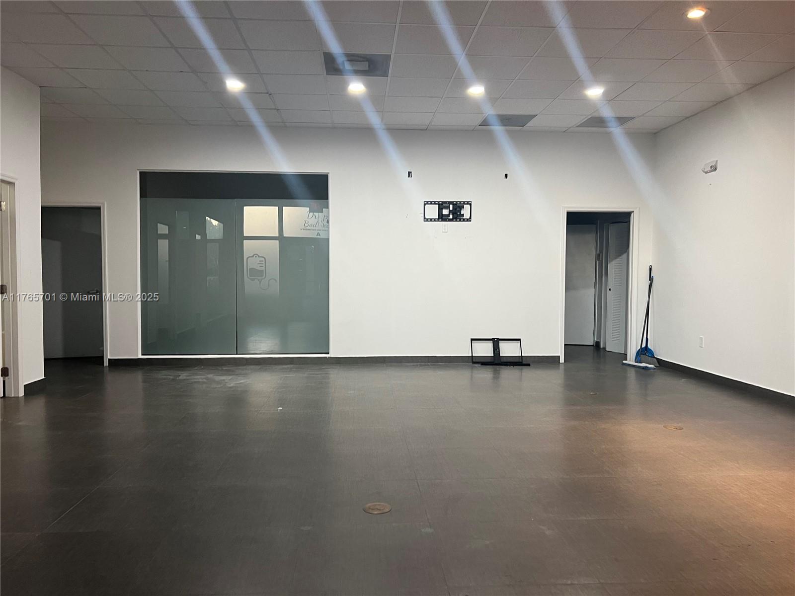 Centrally located office space with four offices, break room, bath with a reception/work area. First Floor visibility via main road of Ponce de Leon.